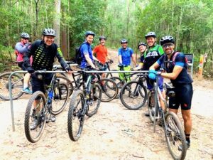 Guided cycling tours along gravel bike roads and single track mountain bike trails with flow trails and beer